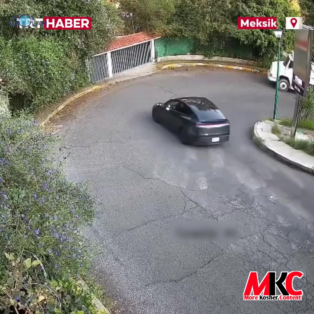 Security video from Mexico shows a car speeding down a residential street after its driver lost control. It…