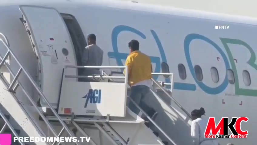🇺🇸 WATCH: ICE detainees were seen boarding an airplane at Newark Airport for a deportation flight.