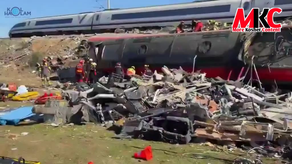 Spanish military emergency crews search the wreckage of the high-speed train collision in Toledo province, w…
